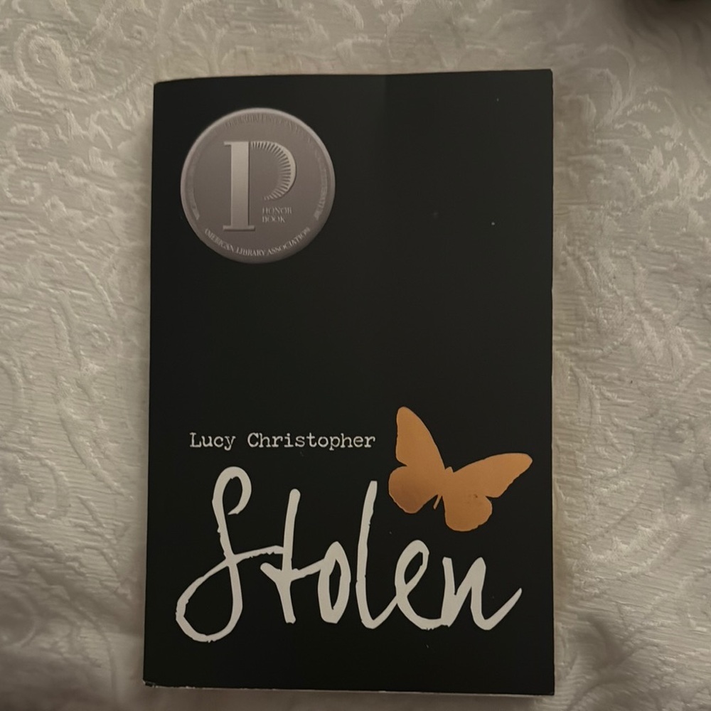 Stolen by Lucy Christopher - Black and Orange Cover